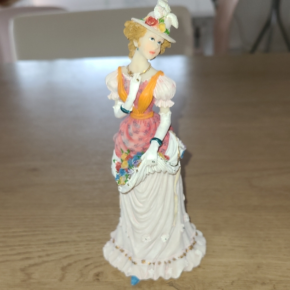 Elegant Lady Figurine in White and Orange Dress